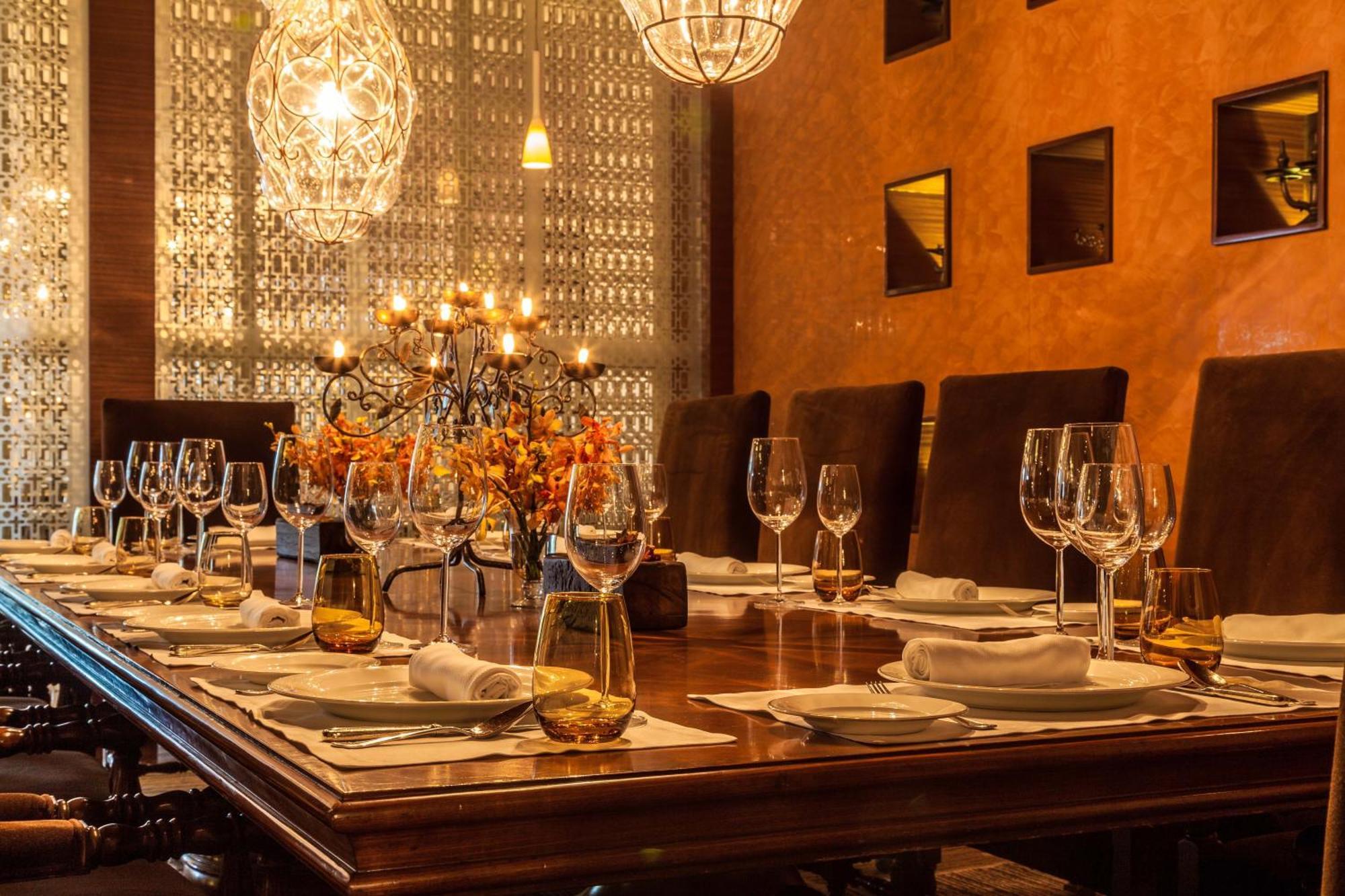 The Leela Ambience Gurugram Hotel & Residences - The Luxury Urban Sanctuary Gurgaon Bagian luar foto A dining room table set for a meal